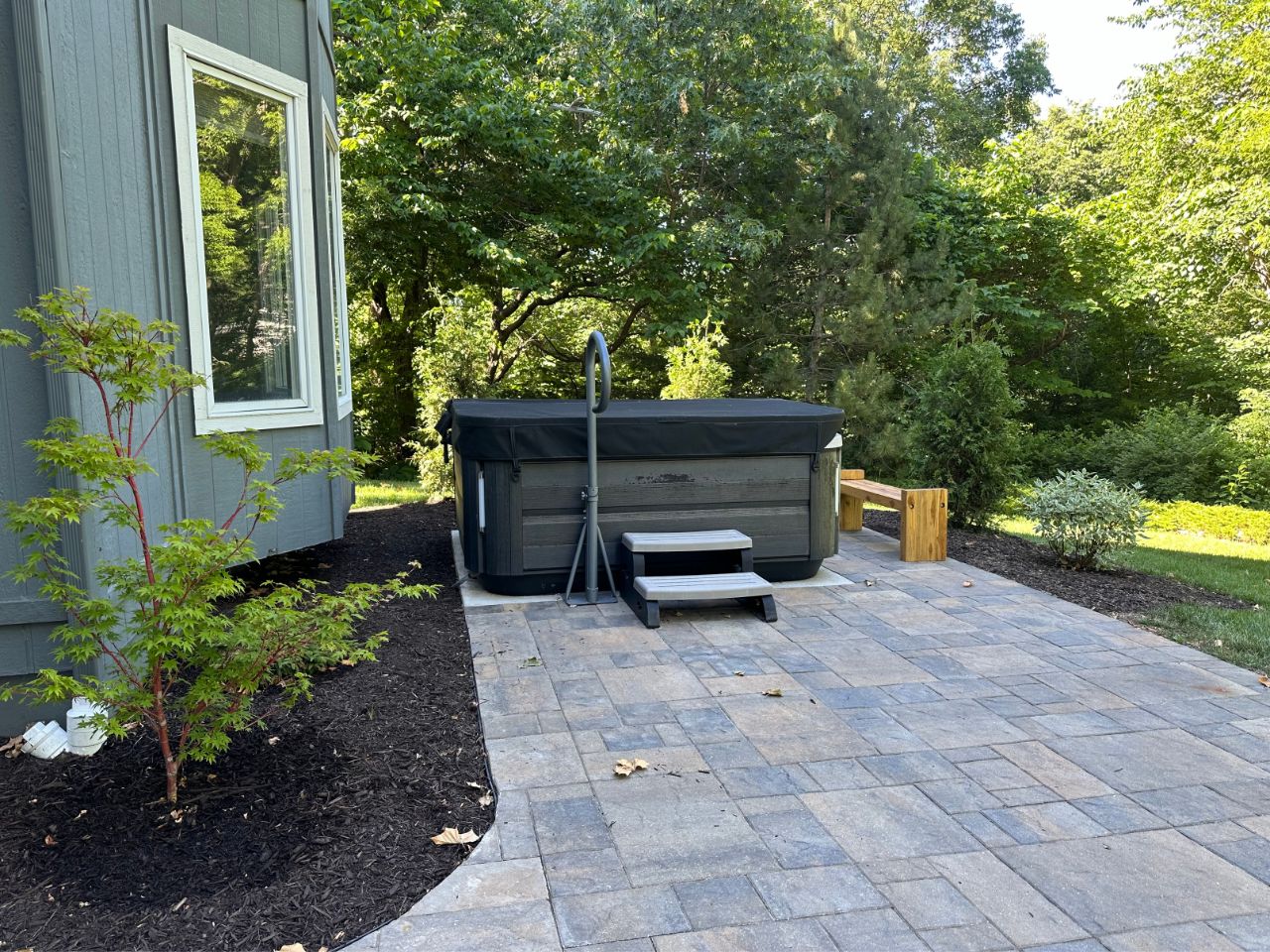 Custom paver patio with plant screen in Overland Park, Kansas